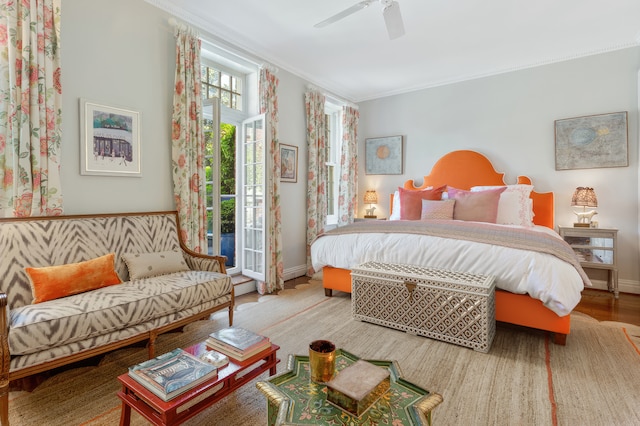 27 Perry St, New York City, NY 10014 - bedroom featuring ornamental molding, wood finished floors, access to outside, and a ceiling fan