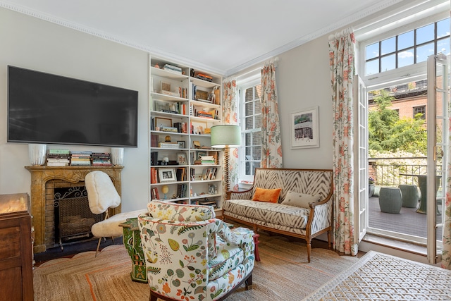 27 Perry St, New York City, NY 10014 - sitting room featuring crown molding and a fireplace