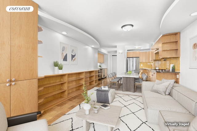living area featuring recessed lighting