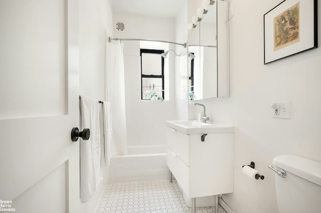full bathroom with vanity, shower / bath combination with curtain, toilet, and visible vents