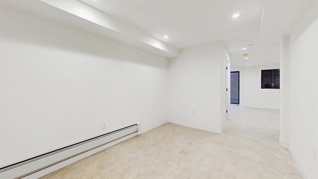 800 5th Ave Unit 1A, New York City, NY 11232 - unfurnished room with a baseboard heating unit, recessed lighting, and baseboards