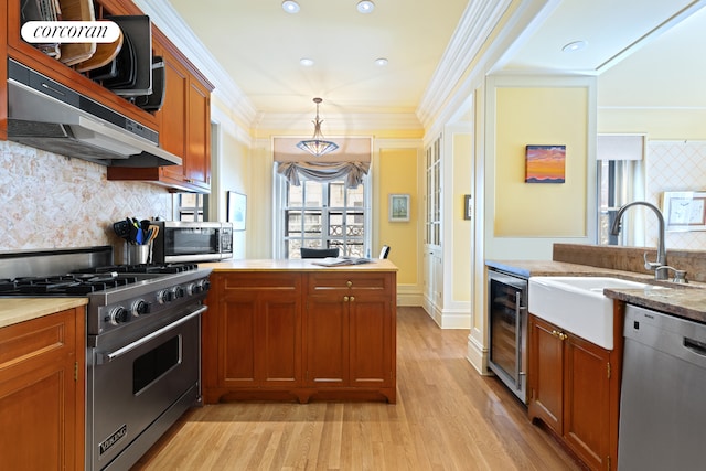 2109 Broadway Unit 1079, New York City, NY 10023 - kitchen featuring appliances with stainless steel finishes, wine cooler, a sink, light wood-style flooring, and tasteful backsplash