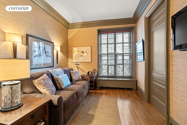 2109 Broadway Unit 1079, New York City, NY 10023 - living room featuring wood-type flooring, crown molding, and wallpapered walls
