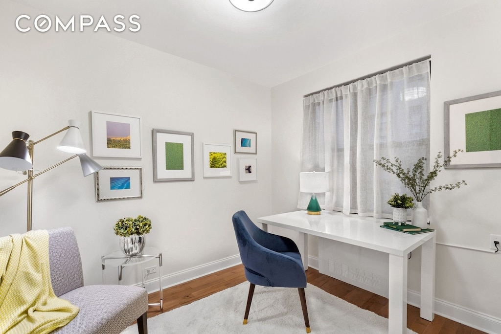 345 Riverside Dr Unit 1E, New York City, NY 10025 - home office featuring baseboards and wood finished floors