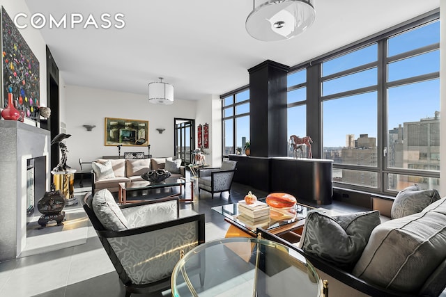 450 E 83rd St Unit Ph1B, New York City, NY 10028 - living area with a city view and a fireplace