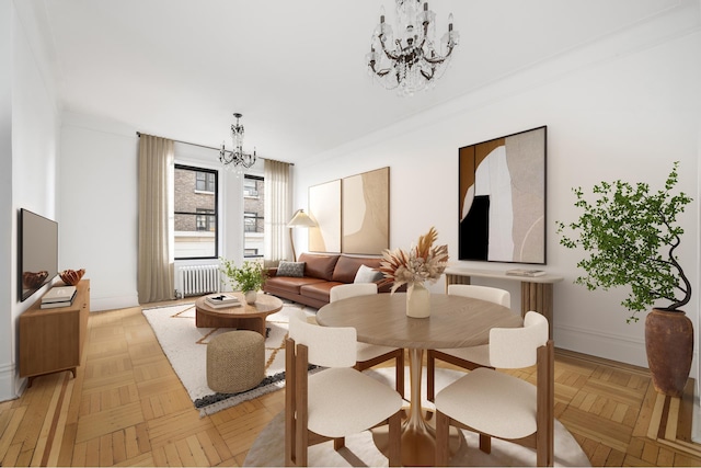 dining area featuring baseboards, an inviting chandelier, and radiator