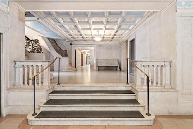 staircase with crown molding