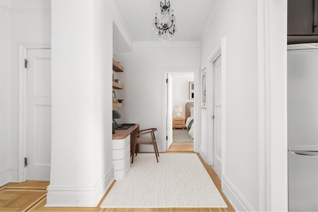 hallway featuring crown molding