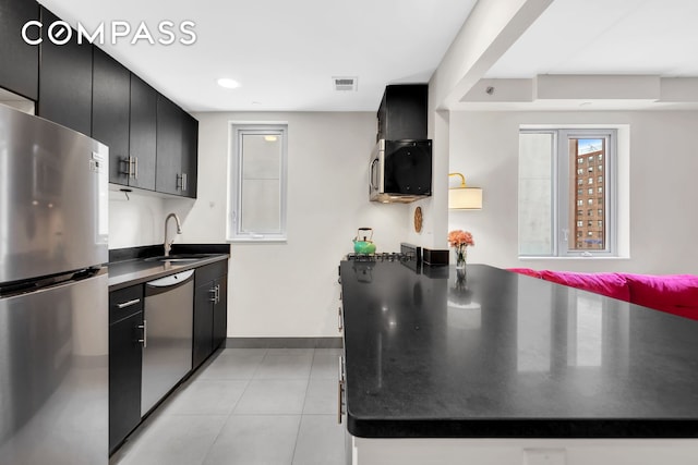 1810 3rd Ave Unit A7C, New York City, NY 10029 - kitchen with stainless steel appliances, a sink, dark cabinets, and dark countertops