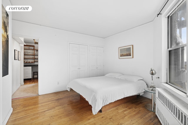 789 W End Ave Unit Ph6, New York City, NY 10025 - bedroom with radiator heating unit, light wood finished floors, and a closet