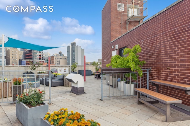 456 W 167th St Unit 7C, New York City, NY 10032 - view of patio featuring a city view
