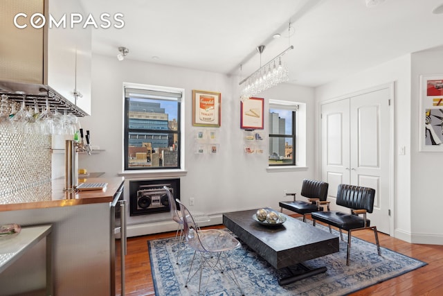 456 W 167th St Unit 7C, New York City, NY 10032 - living room with hardwood / wood-style floors and baseboards