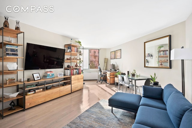 350 W 50th St Unit 3Ll, New York City, NY 10019 - living area featuring an office area and wood finished floors