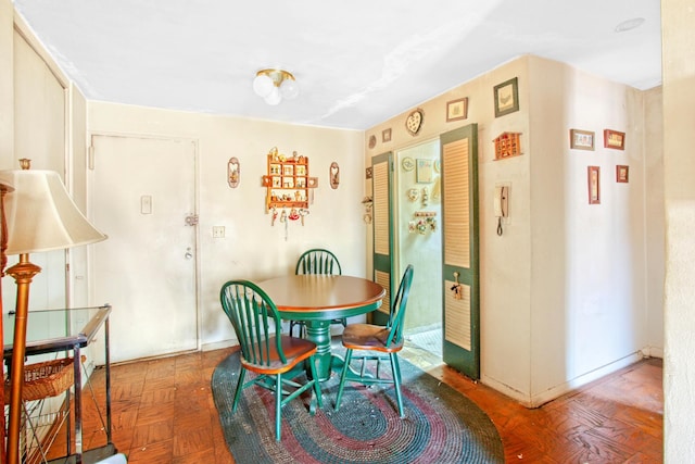 dining room with baseboards