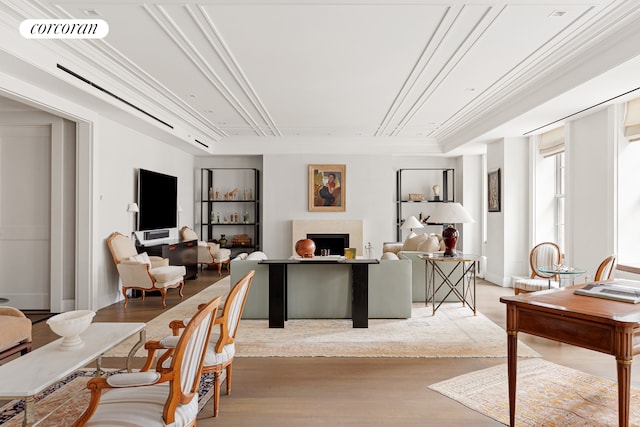 40 E 72nd St Unit 5, New York City, NY 10021 - home office featuring light wood-style floors and a fireplace