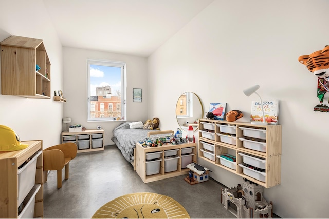 bedroom with finished concrete floors