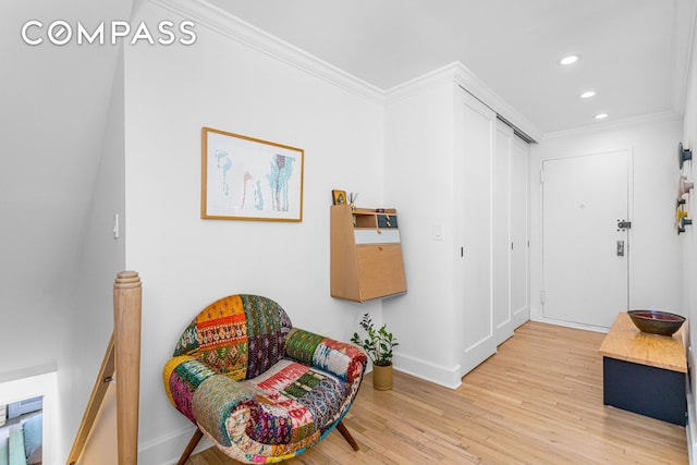 250 W 15th St Unit 3C, New York City, NY 10011 - sitting room featuring light wood-style flooring, crown molding, baseboards, and recessed lighting