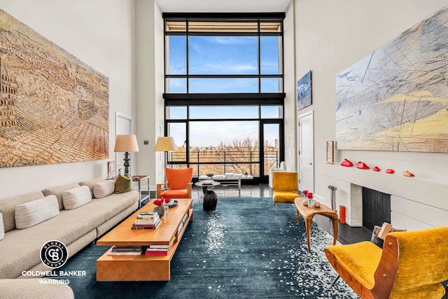 170 E End Ave Unit 8/9E, New York City, NY 10128 - living area featuring a high ceiling and expansive windows
