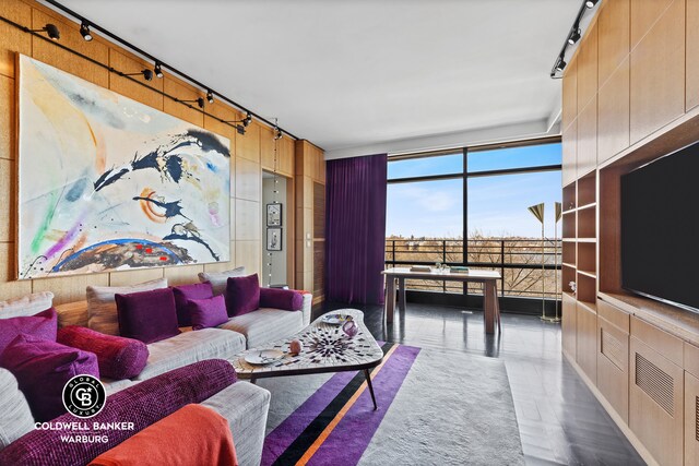 170 E End Ave Unit 8/9E, New York City, NY 10128 - living room with rail lighting and expansive windows