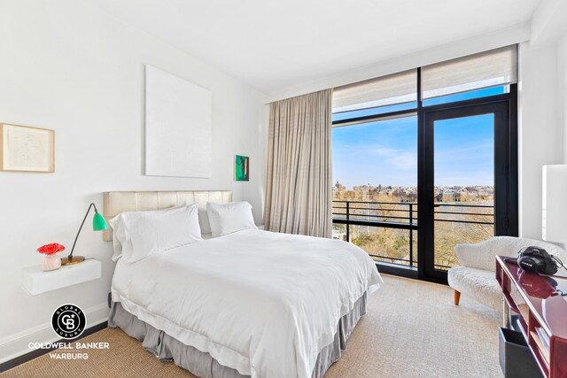 170 E End Ave Unit 8/9E, New York City, NY 10128 - bedroom with floor to ceiling windows and multiple windows