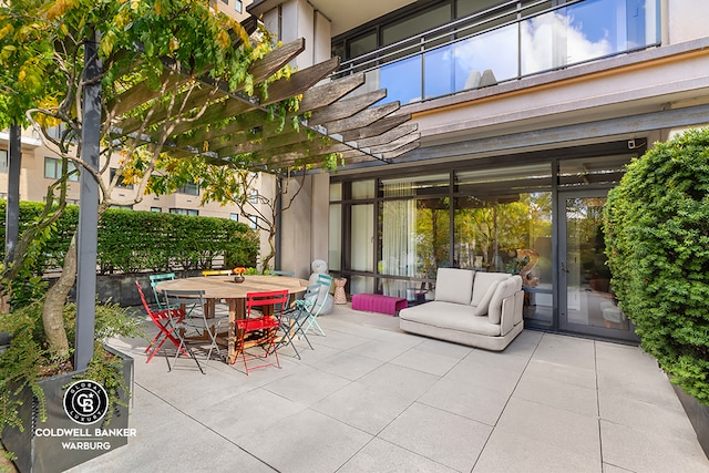 170 E End Ave Unit 8/9E, New York City, NY 10128 - view of patio featuring outdoor dining area and a pergola