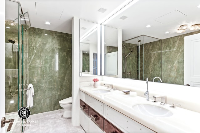 170 E End Ave Unit 8/9E, New York City, NY 10128 - full bathroom featuring toilet, a stall shower, double vanity, and tile walls