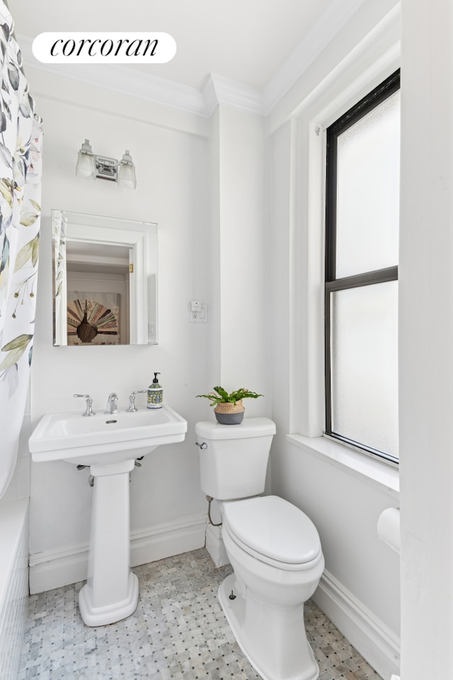 220 W 93rd St Unit 6A, New York City, NY 10025 - bathroom featuring crown molding, a shower with shower curtain, and a tub