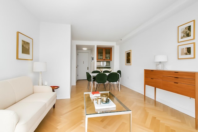 205 E 85th St Unit 7-B, New York City, NY 10028 - living room with baseboards