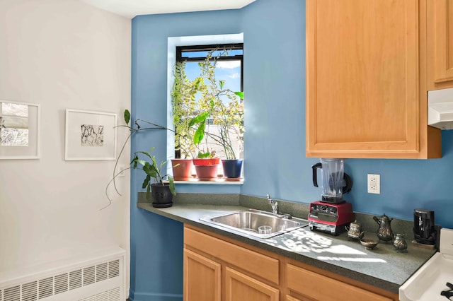 7 2nd Ave Unit 2-B, New York City, NY 10003 - kitchen featuring radiator, dark countertops, and range