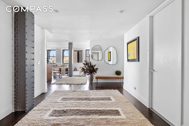 150 Nassau St Unit 18Ab, New York City, NY 10038 - corridor with baseboards and dark wood-type flooring