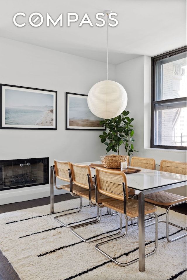 150 Nassau St Unit 18Ab, New York City, NY 10038 - dining room with a glass covered fireplace