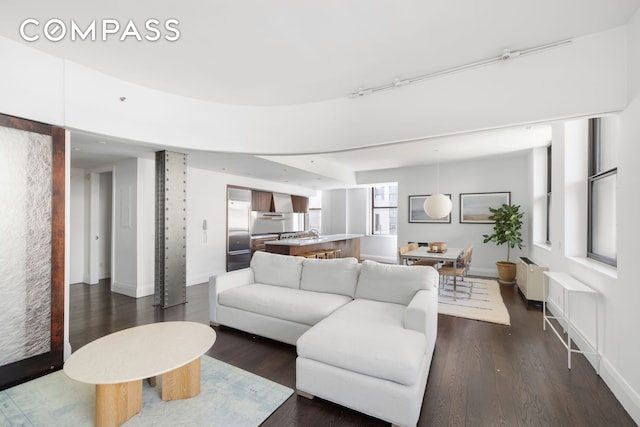 150 Nassau St Unit 18Ab, New York City, NY 10038 - living area featuring baseboards and dark wood finished floors