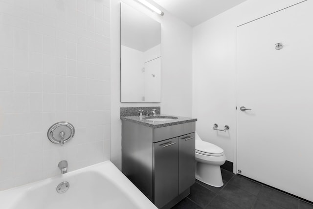 230 Ashland Pl Unit 11D, New York City, NY 11217 - bathroom featuring vanity, tile patterned flooring, shower / tub combination, and toilet