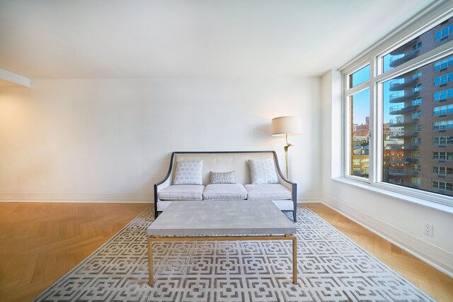 205 E 85th St Unit 8K, New York City, NY 10028 - living area featuring baseboards