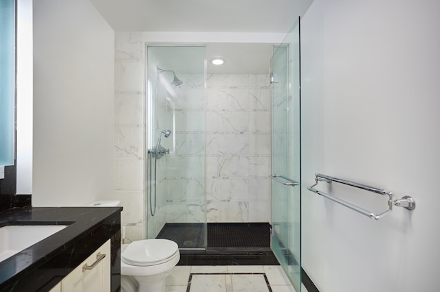 205 E 85th St Unit 8K, New York City, NY 10028 - bathroom with toilet, a marble finish shower, vanity, and recessed lighting