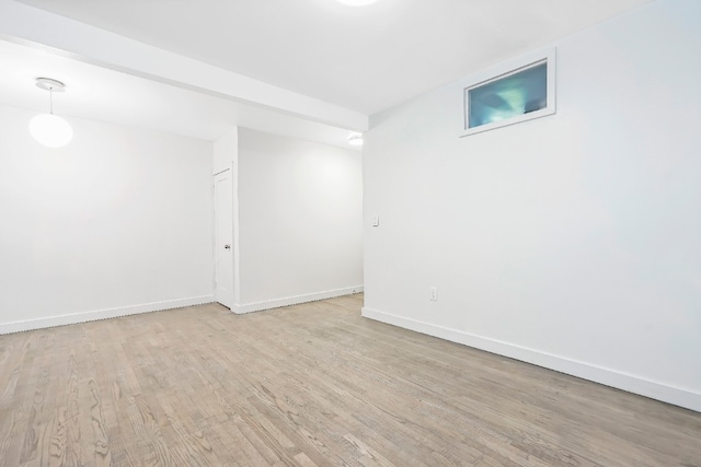309 Covert St, New York City, NY 11237 - unfurnished room featuring wood finished floors and baseboards