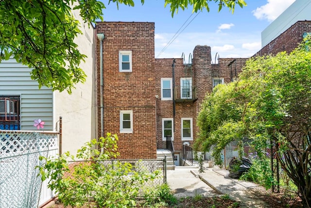 309 Covert St, New York City, NY 11237 - back of property featuring brick siding