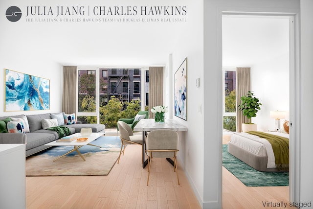 540 W 49th St Unit 307S, New York City, NY 10019 - living area featuring wood finished floors