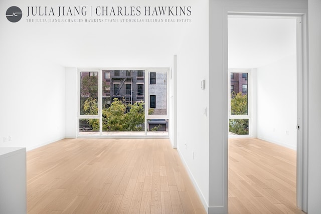 540 W 49th St Unit 307S, New York City, NY 10019 - hallway with wood finished floors