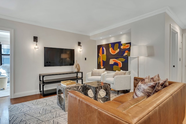 living room featuring wood finished floors, crown molding, baseboards, and recessed lighting
