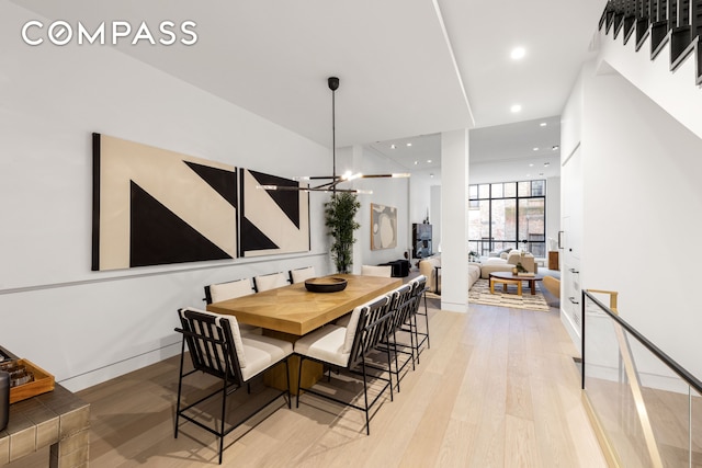 54 E 80th St, New York City, NY 10075 - dining room featuring light wood-style flooring, a chandelier, recessed lighting, and baseboards