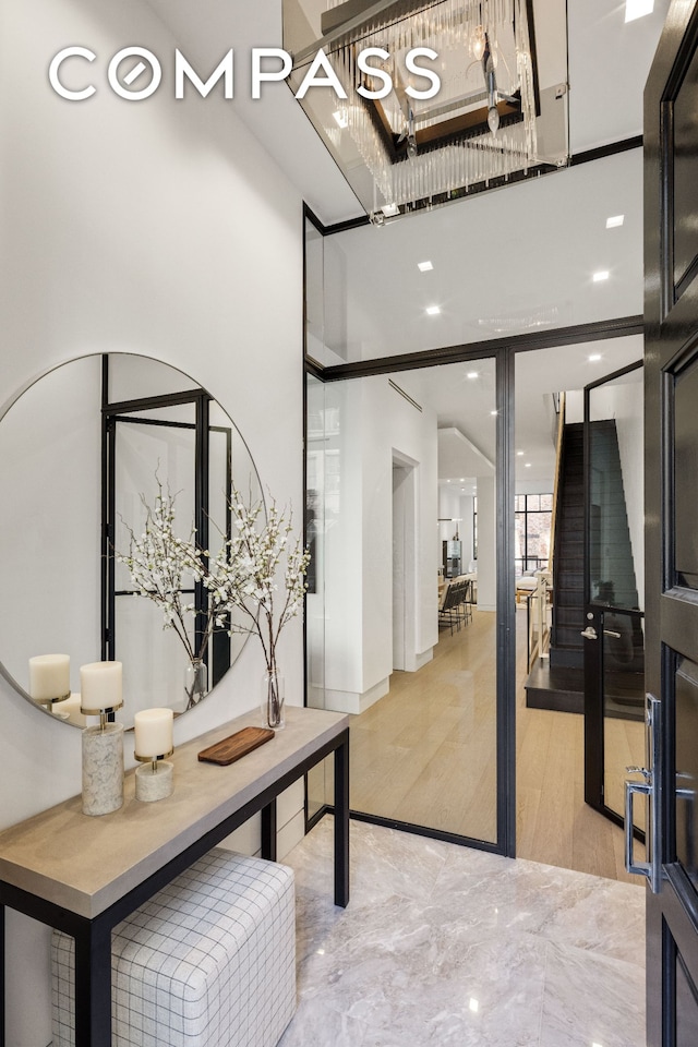 54 E 80th St, New York City, NY 10075 - interior space featuring a towering ceiling and wood finished floors