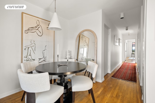 181 7th Ave Unit 14A, New York City, NY 10011 - dining room featuring light wood finished floors and baseboards