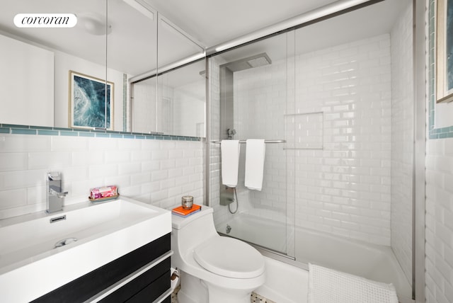 181 7th Ave Unit 14A, New York City, NY 10011 - full bathroom with tile walls, a shower with shower door, and vanity