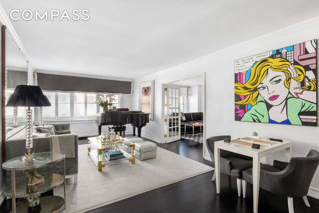27 E 65th St Unit 10Bc, New York City, NY 10065 - living room with crown molding, baseboards, and dark wood-style floors