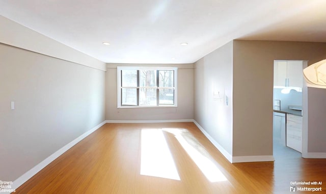 2244 Bronx Park E Unit 1B, New York City, NY 10467 - empty room with light wood finished floors and baseboards