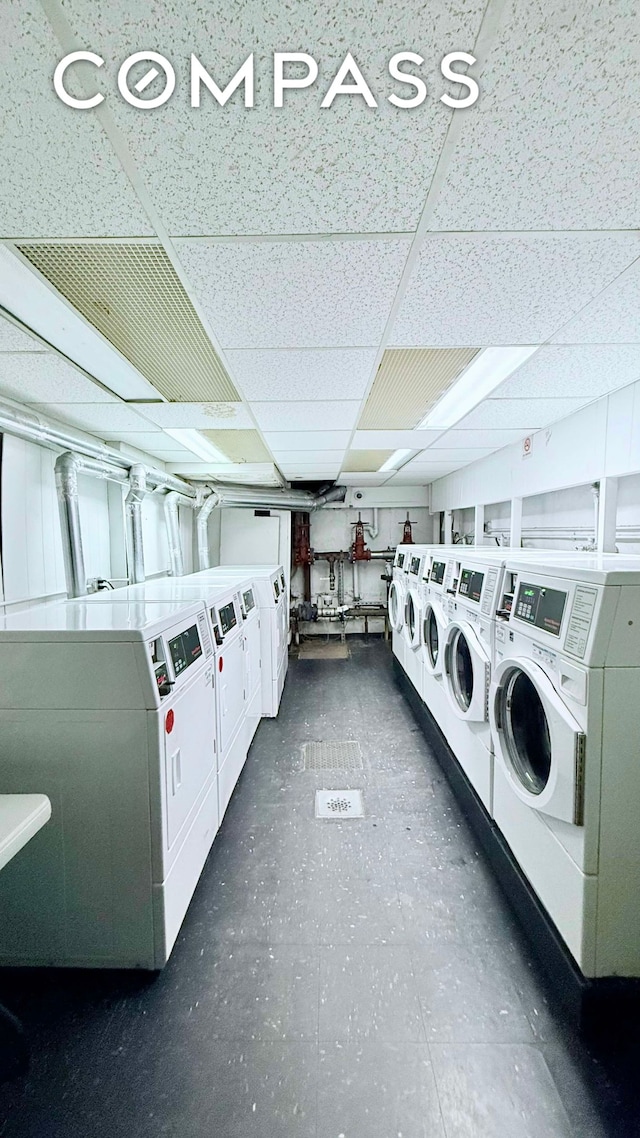 community laundry room with washing machine and dryer
