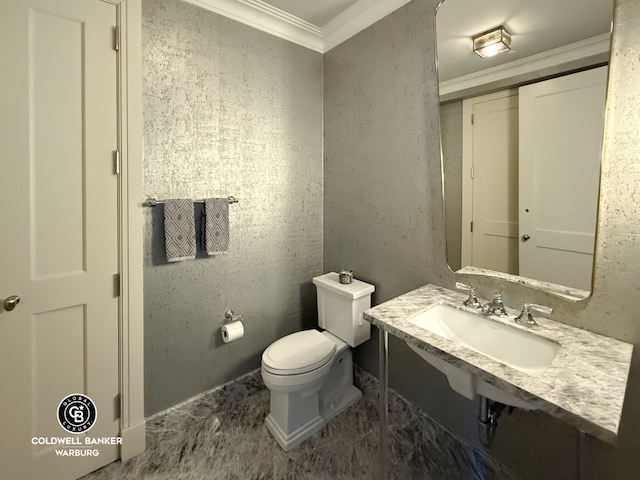 101 W 78th St Unit 5B, New York City, NY 10024 - bathroom featuring toilet, a sink, and ornamental molding