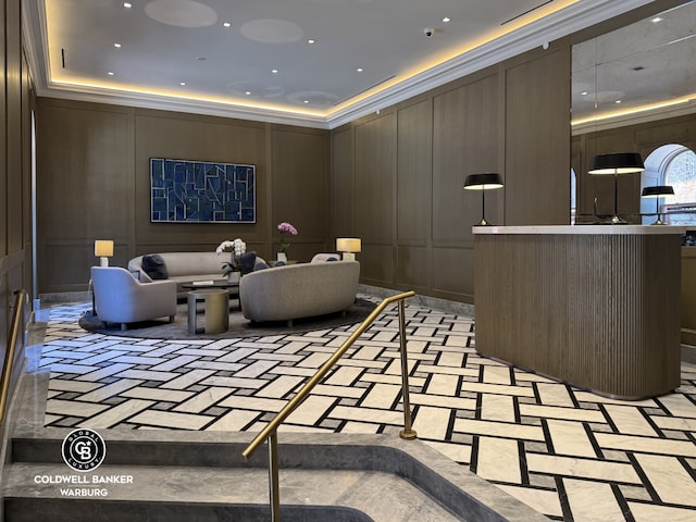 101 W 78th St Unit 5B, New York City, NY 10024 - lobby with a decorative wall and a surveillance system