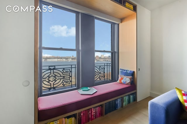 265 Riverside Dr Unit 11F, New York City, NY 10025 - living area with healthy amount of natural light, wood finished floors, and a water view